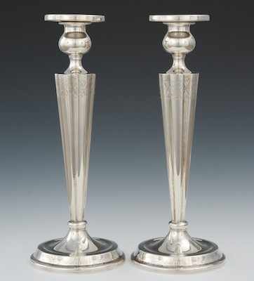 Appraisal: A Pair of Sterling Silver Candleholders Of fluted shape with