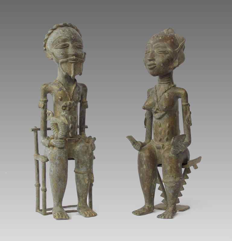 Appraisal: PAIR OF AFRICAN BRONZE IVORY COAST BAULE TRIBAL FIGURES Seated