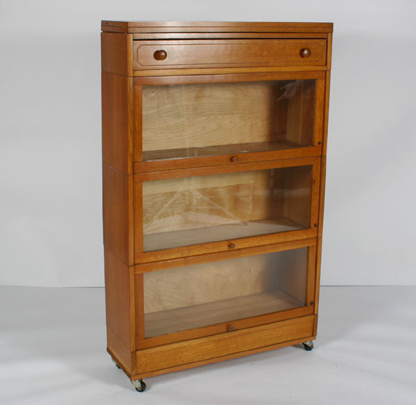 Appraisal: Lundtrsom three stack barrister bookcase with glass fronts plus base