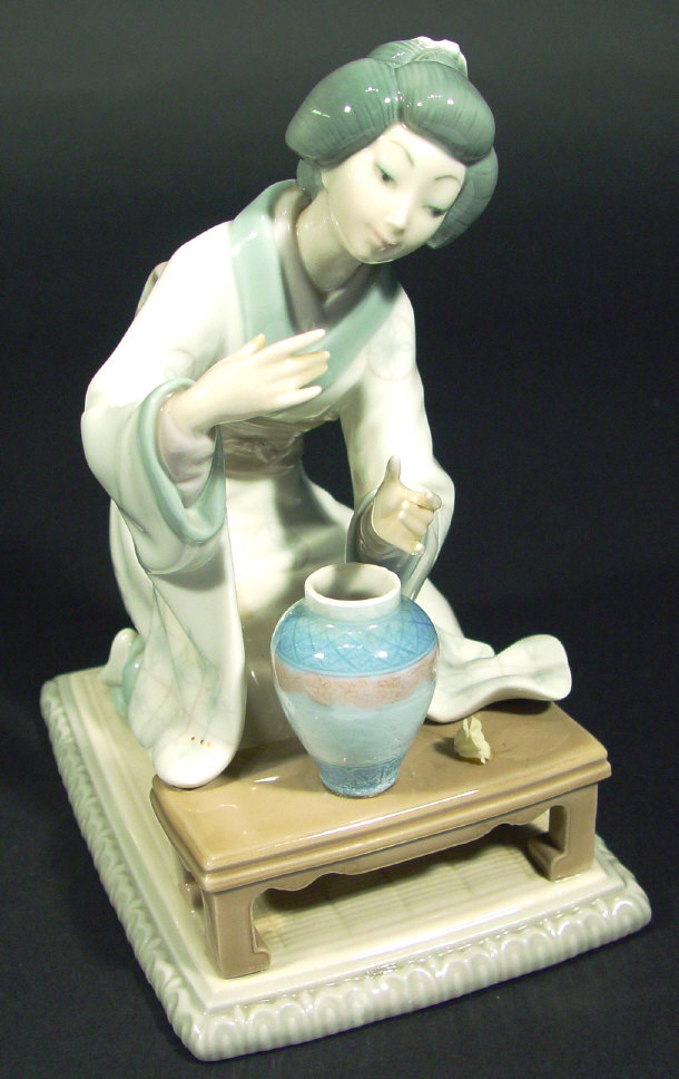 Appraisal: Lladro porcelain figurine 'Oriental Girl Arranging Flowers' printed and impressed