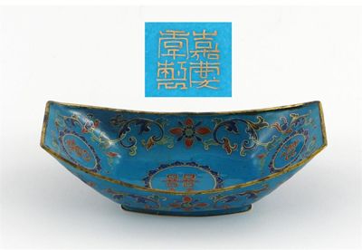 Appraisal: A Chinese enamelled boat-shaped bowl decorated with circular panels containing