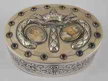 Appraisal: A French silver oval box the lid embossed with a