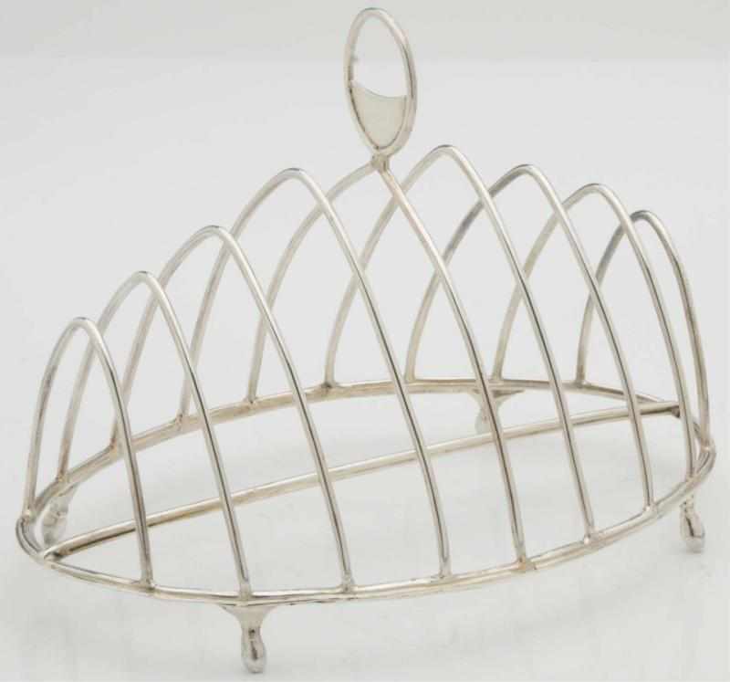 Appraisal: An English Silver Toast Rack Robert Hennell London With a