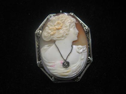 Appraisal: Oval cameo chatelaine pin th- th century Perfect bust lady