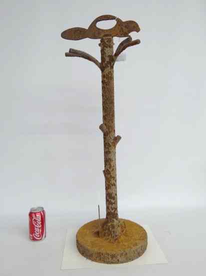 Appraisal: Cast iron faux bark cast stand with beaver motif ''