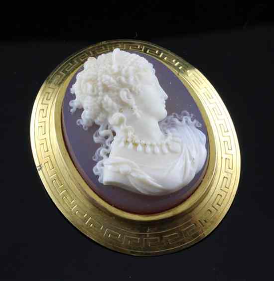 Appraisal: A Victorian gold framed hardstone cameo brooch carved with a