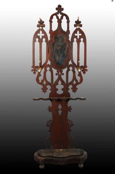 Appraisal: Gothic Hall Tree with Mirror Description Walnut with metal base