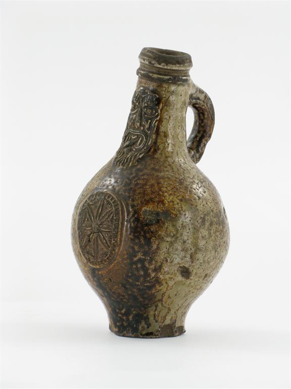 Appraisal: A stoneware Bellarmine or Bartmann s type jug