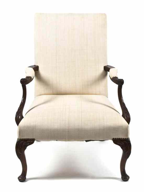 Appraisal: A George III Style Mahogany Armchair having an upholstered back