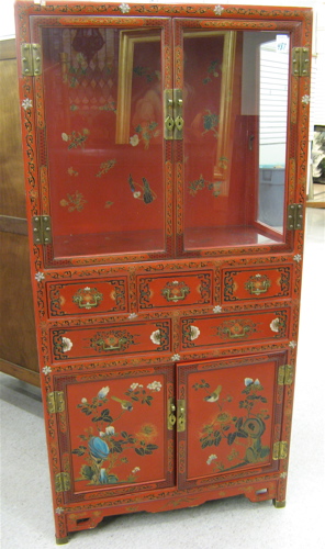 Appraisal: CHINESE DISPLAY CABINET ON CABINET with polychrome floral decoration on