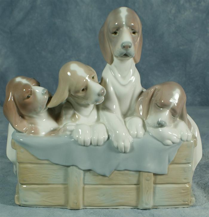 Appraisal: Lladro figurine four puppies in a basket long x tall