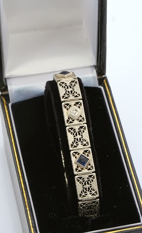 Appraisal: KW filigree link bracelet ct diamond and mm square syntheticblue