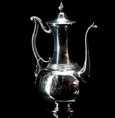 Appraisal: An early th century continental silver coffee pot with incised