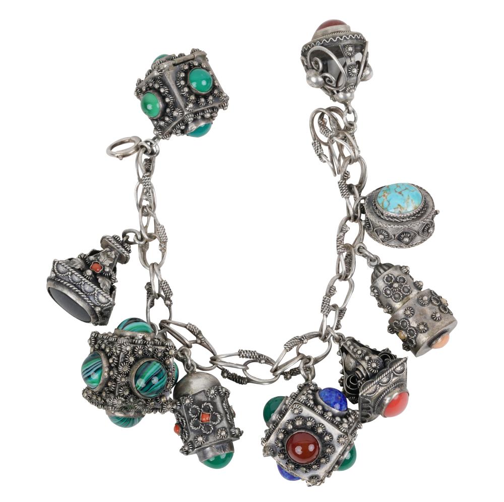 Appraisal: SILVER MULTI-GEM CHARM BRACELETcomprising nine charms set with glass dyed