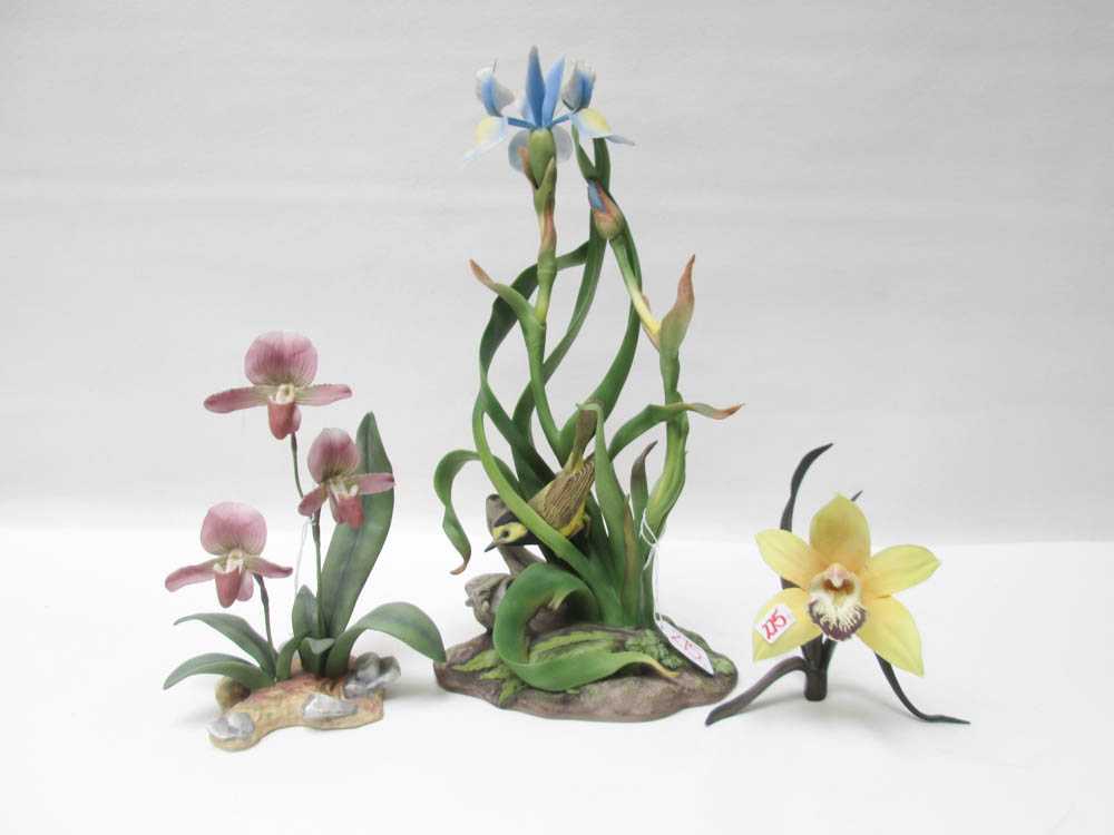 Appraisal: THREE BOEHM BISQUE SCULPTURES including the Hooded Warbler Lady's Slipper