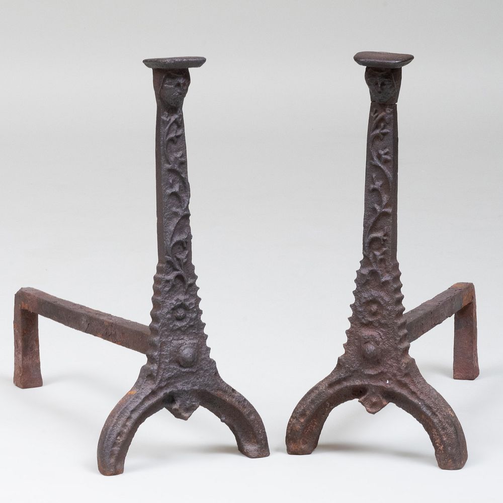 Appraisal: Pair of Wrought-Iron Figural Andirons Headed by masks and continuing