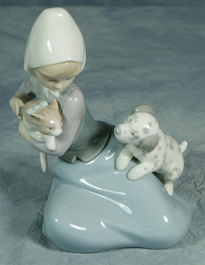 Appraisal: Lladro figurine young girl with cat and puppy tall Estimate