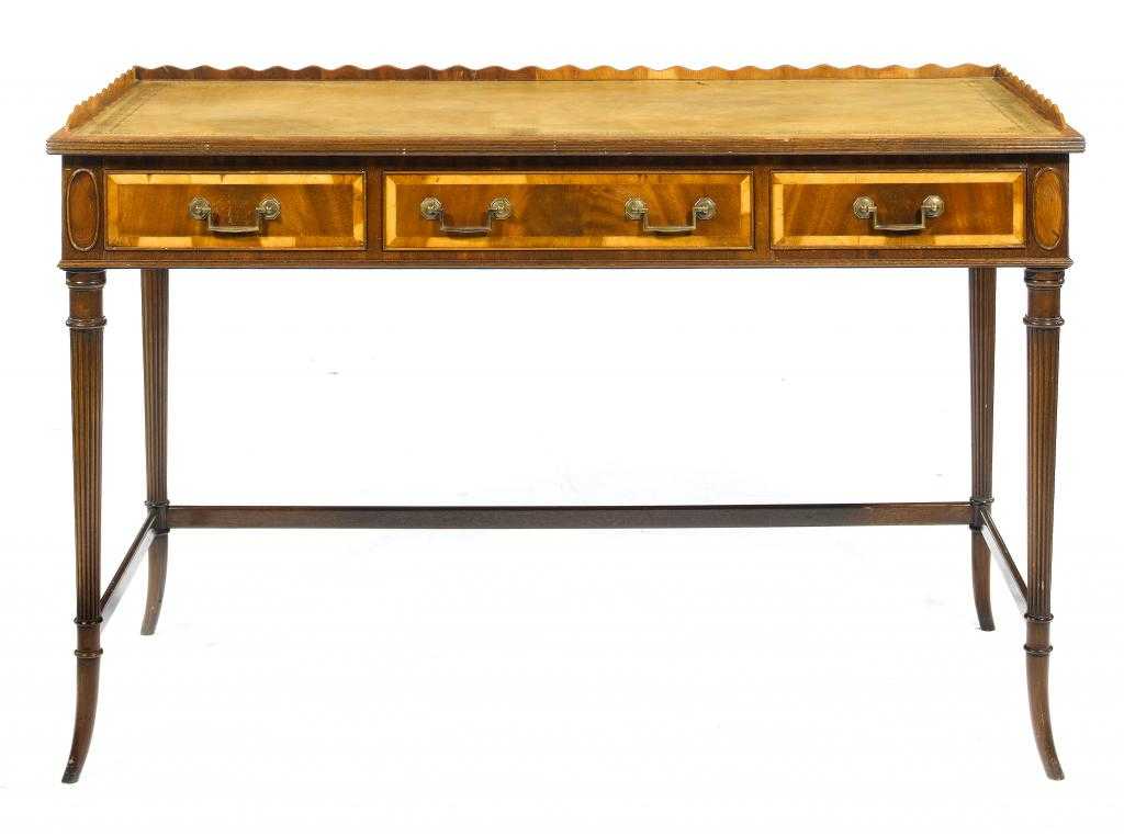 Appraisal: A MAHOGANY WRITING TABLE in Regency style with leather inlet