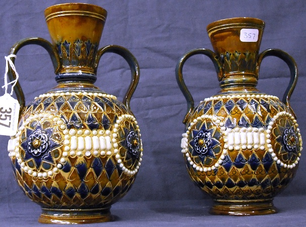 Appraisal: Pair of Royal Doulton Lambeth Two Handled Vases in the