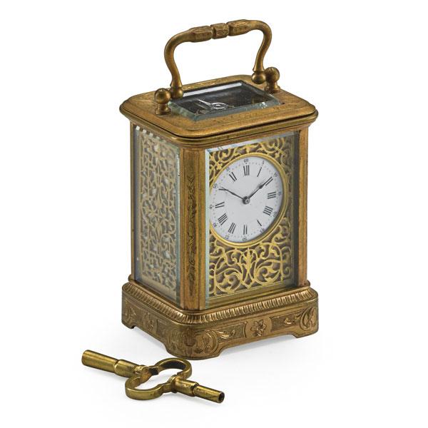 Appraisal: MINIATURE CARRIAGE CLOCK Time only brass with beveled glass and