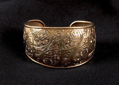 Appraisal: K yellow gold cuff bracelet marked FOB and with floral