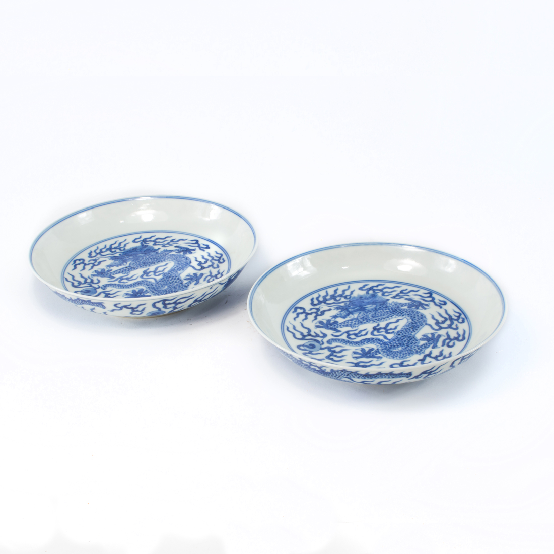 Appraisal: PAIR OF CHINESE BLUE AND WHITE 'DRAGON' DISHES Pair of