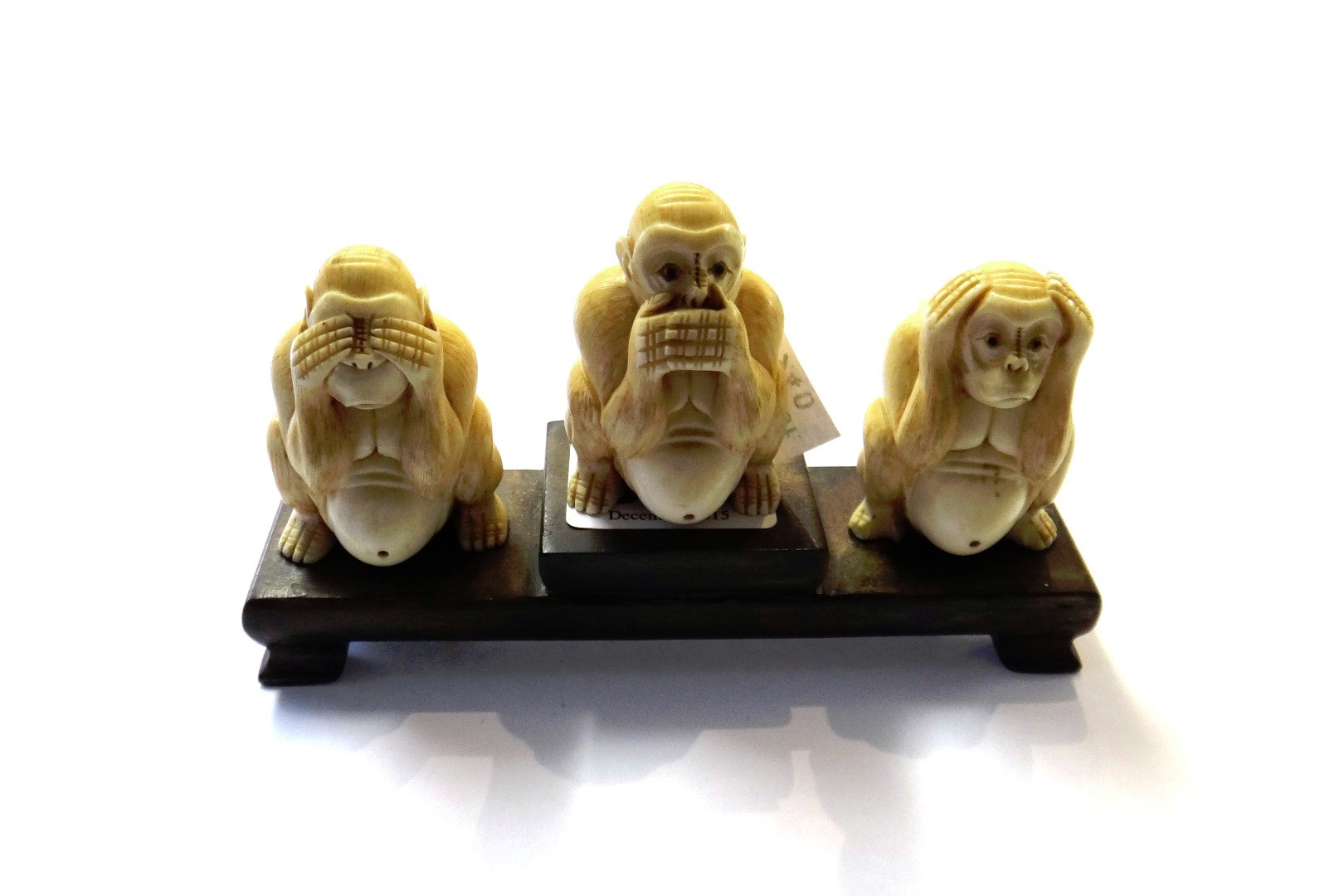 Appraisal: A group of three Japanese ivory carvings of the three