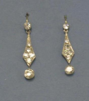 Appraisal: A PAIR OF DIAMOND EARRINGS having lozenge diamond set panel