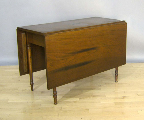 Appraisal: Sheraton walnut drop leaf table th c h w d