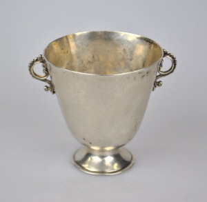 Appraisal: An unmarked white metal conical cup of primitive form with