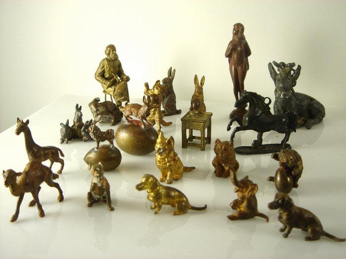 Appraisal: Miniature animal other figures cats dogs rabbits stag bear shoemaker