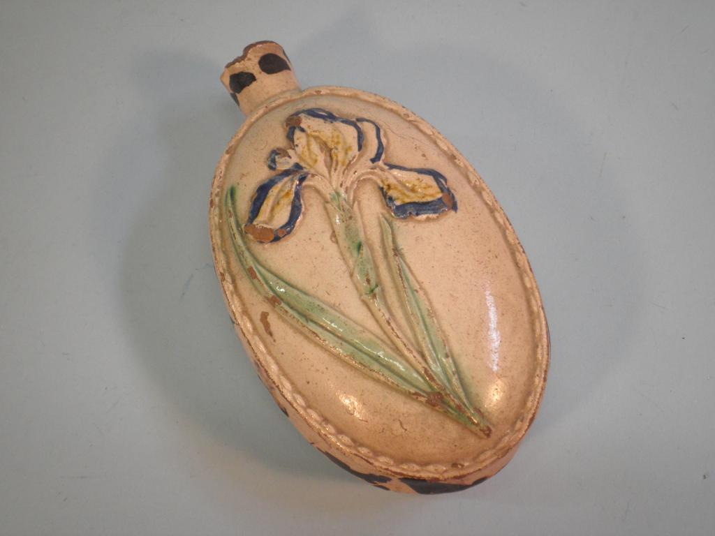 Appraisal: A late th early thC pottery ovoid flask decorated with