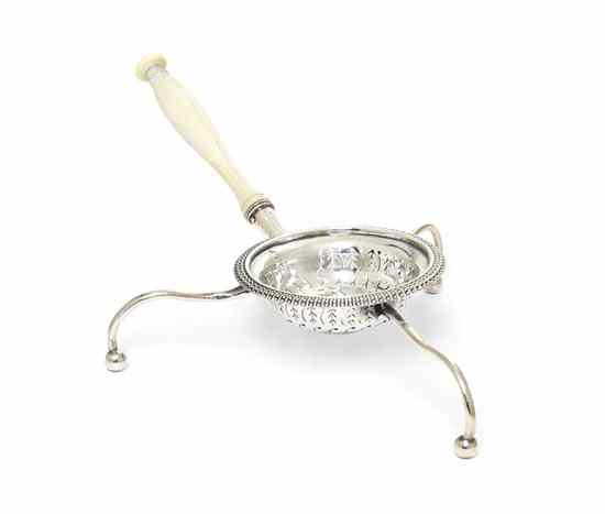 Appraisal: A French Silver Tea Strainer of circular form with a