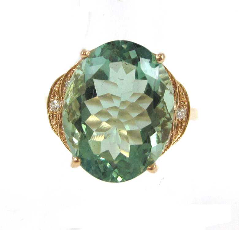 Appraisal: GREEN FLUORITE AND DIAMOND RING k rose gold with three