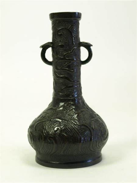 Appraisal: A Chinese bronze vase Ming dynasty or later relief decoration