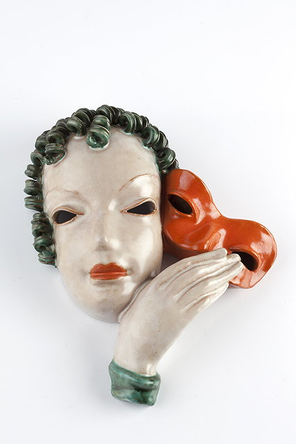 Appraisal: Goldscheider of ViennaArt Deco wall maskthe lady holding a maskstamped