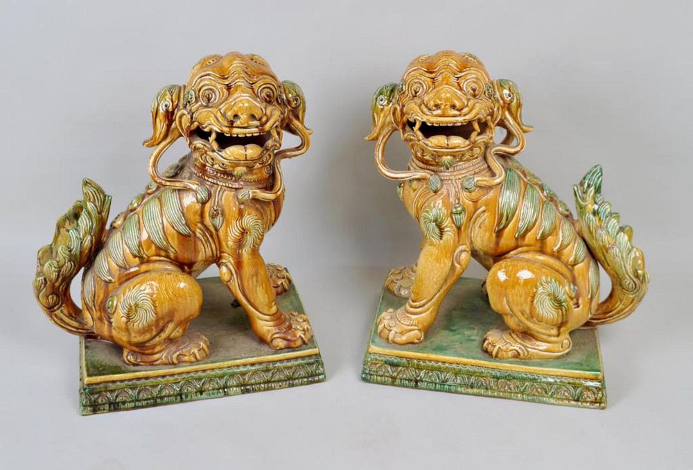 Appraisal: Pair Large Chinese Style Majolica Pottery Foo Dogs each seated