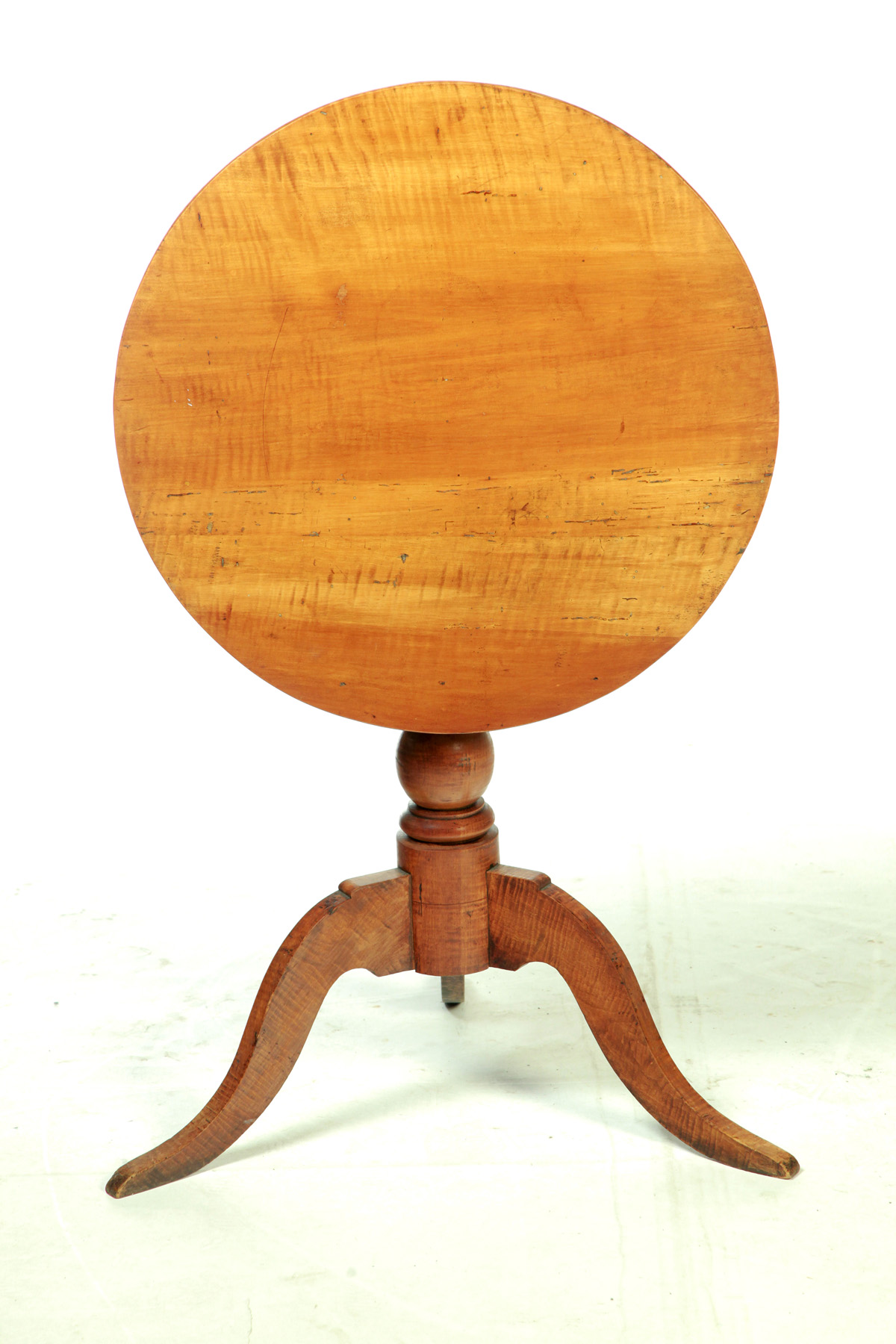 Appraisal: TIGER MAPLE TILT TOP TABLE American mid th century Round