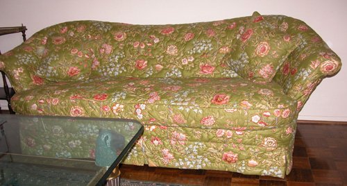 Appraisal: Artist Title Slip covered Sofa with pastel flowers on green