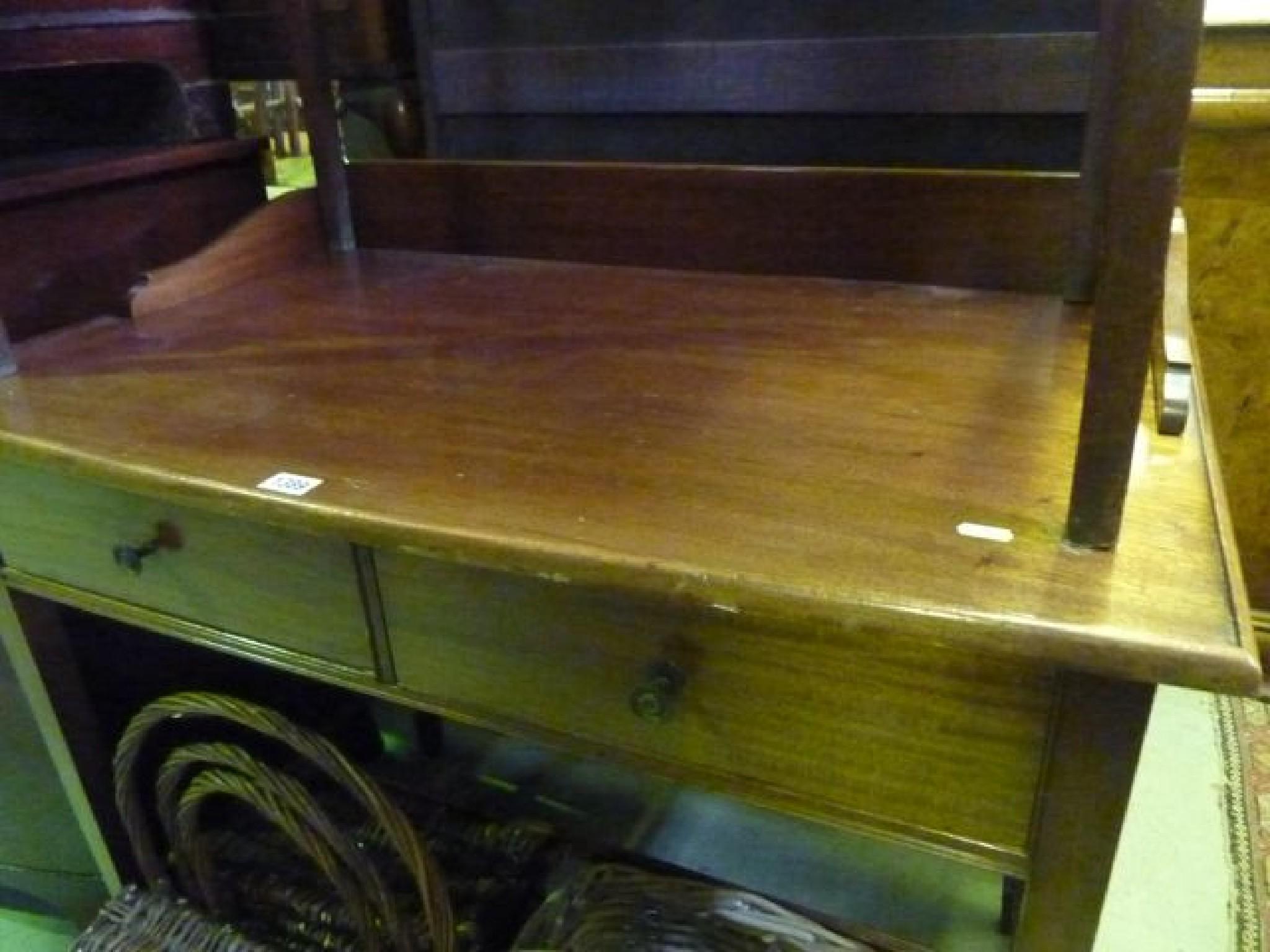 Appraisal: An Edwardian mahogany side dressing table fitted with two frieze