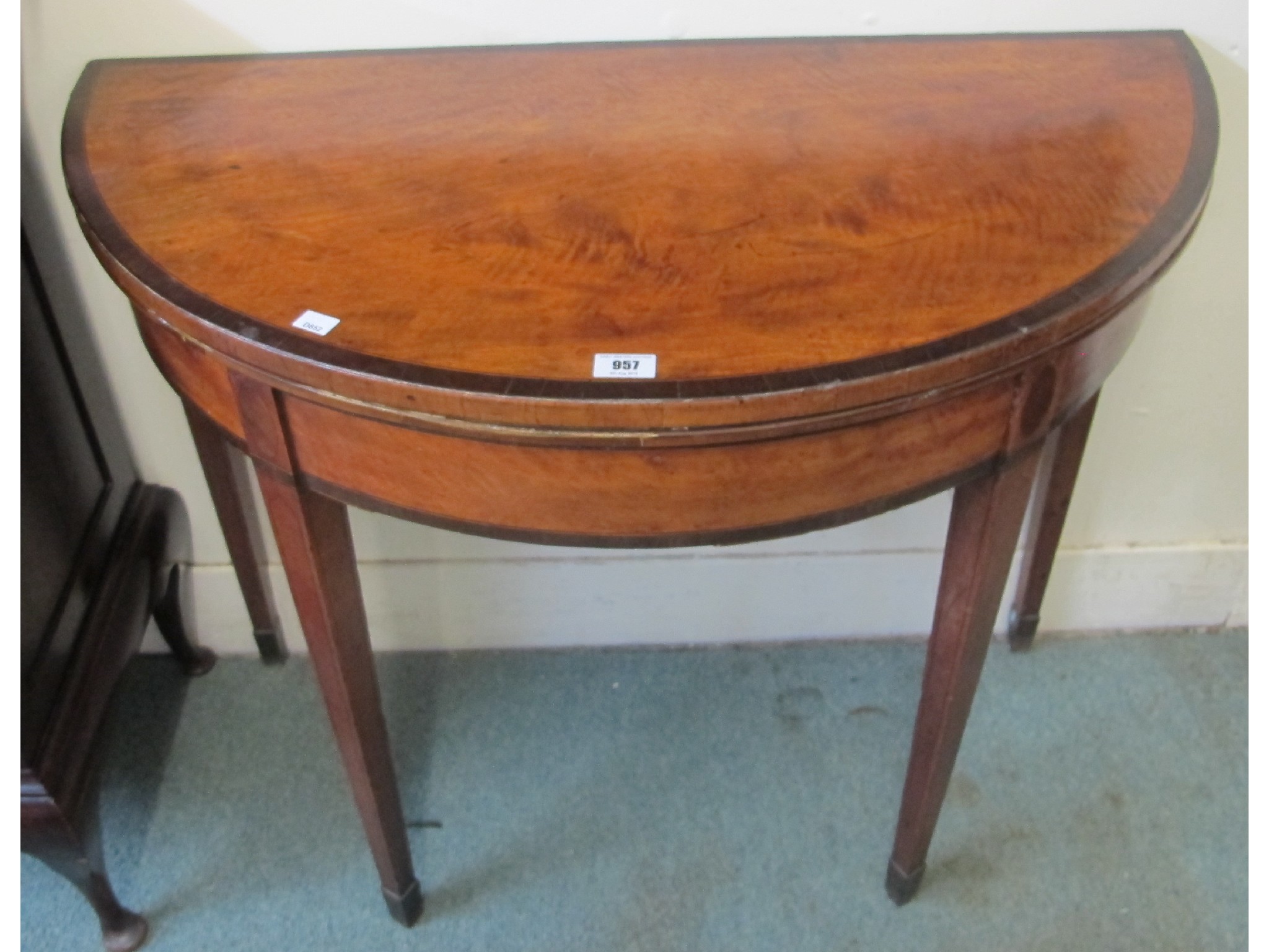 Appraisal: George III mahogany fold over D-end card table