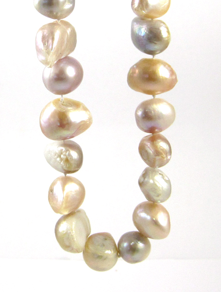 Appraisal: BAROQUE PINK PEARL NECKLACE measuring inches in length and strung