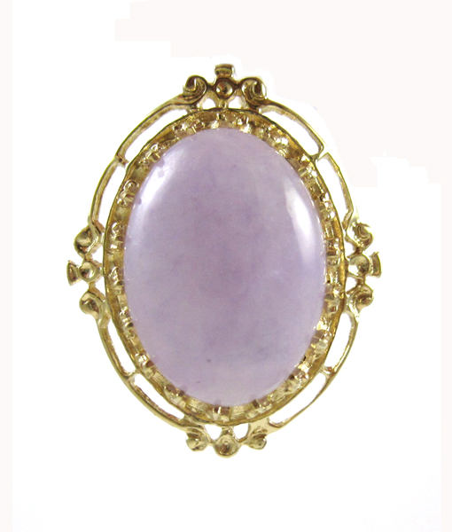 Appraisal: LAVENDER JADE AND FOURTEEN KARAT GOLD PENDANT set with an