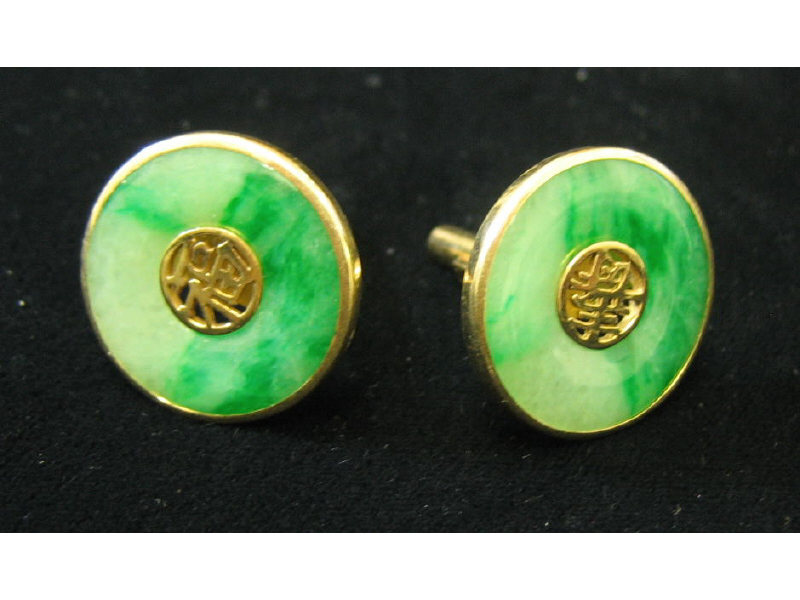 Appraisal: JADE CUFFLINKS k yellow gold with circular mottled green jade