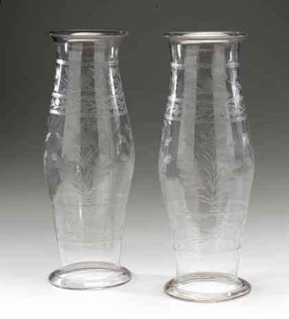 Appraisal: Two uncolored blown and etched glass hurricane shades th century