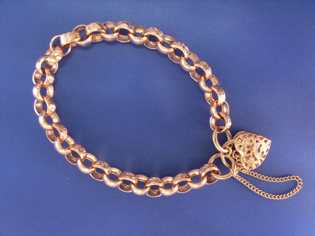 Appraisal: A ct rose gold belcher link bracelet with a padlock