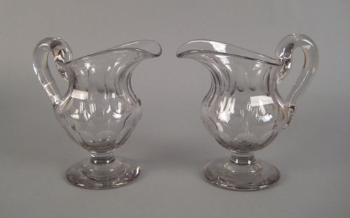 Appraisal: Pair of large Sweeney type blown glass pitchers ca flute