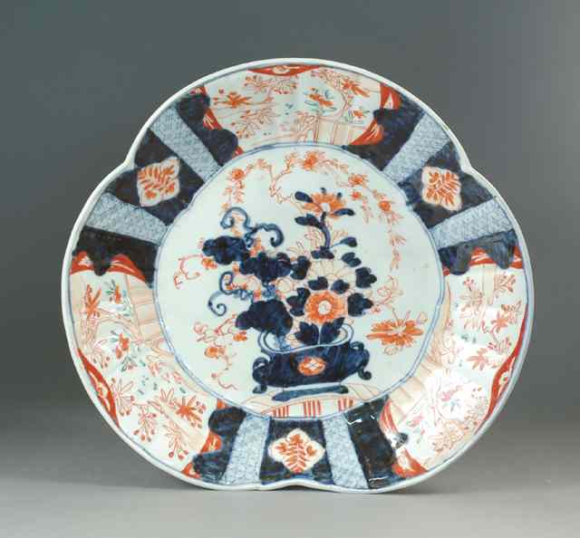 Appraisal: JAPANESE IMARI PORCELAIN TRIANGULAR-SHAPED SERVING PLATTER Hand painted over glaze