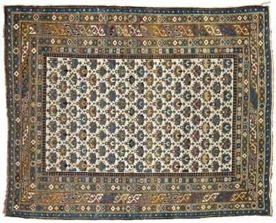 Appraisal: Caucasian rug ivory field with repeating geometric designs multiple minor