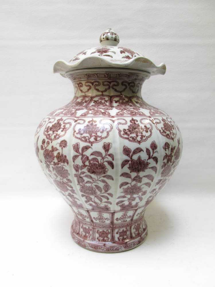 Appraisal: CHINESE MING STYLE PORCELAIN LIDDED JAR hand enameled iron red